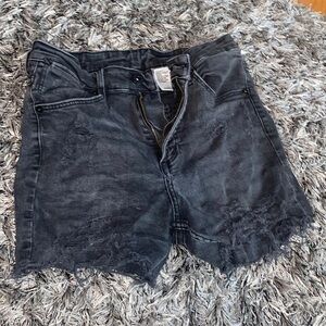 Womens custom distressed black stretchy tight fit denim EUC size 29.